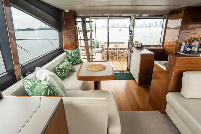 Slide: The Image of Luxurious interior of 2017 Princess S65 yacht with elegant seating and scenic ocean view. - 11