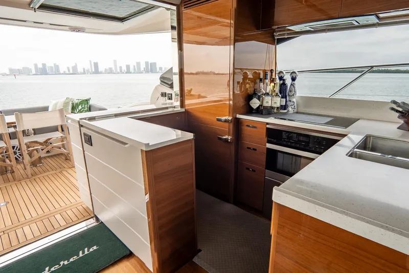 Slide: The Image of Luxurious 2017 Princess S65 yacht interior with modern kitchen and ocean view. - 12