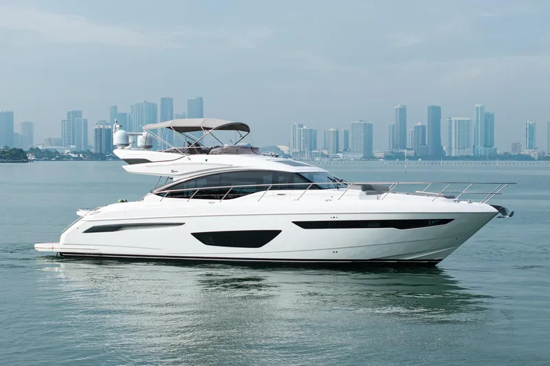 Slide: The Image of 2017 Princess S65 yacht cruising near city skyline. - 3