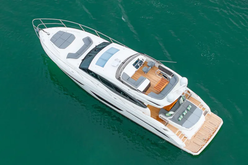 Slide: The Image of Aerial view of 2017 Princess S65 luxury yacht on clear water. - 8