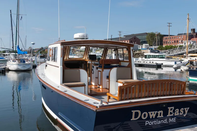 Slide: The Image of 1985 Wilbur 34 boat named "Down Easy" docked in Portland, ME marina. - 20
