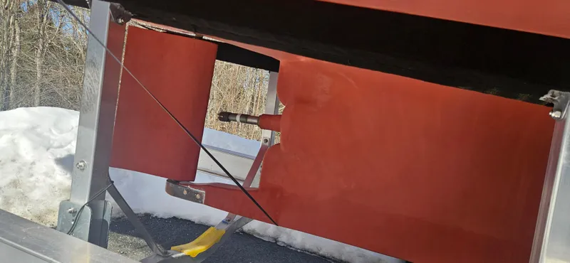 Slide: The Image of Close-up of 1985 Wilbur 34 boat rudder and propeller shaft. - 28