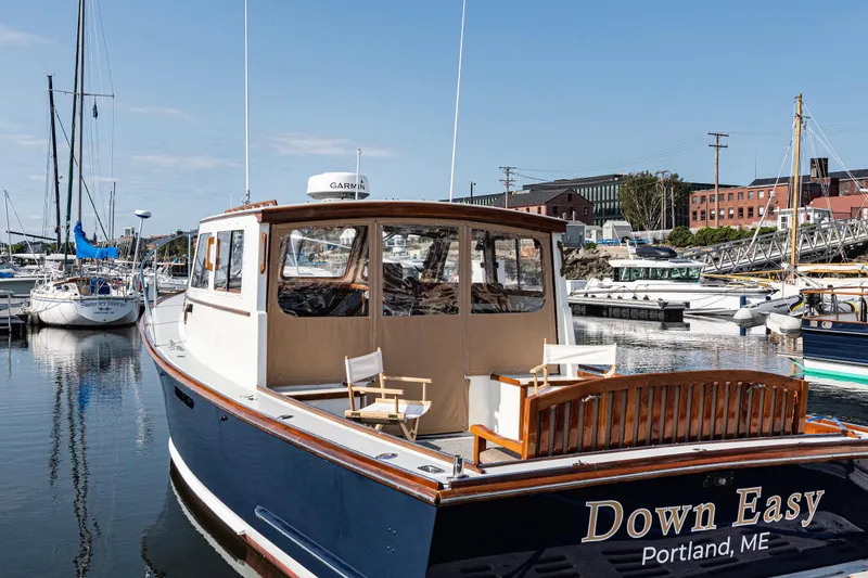 Slide: The Image of 1985 Wilbur 34 boat named "Down Easy" docked in Portland, ME marina. - 4