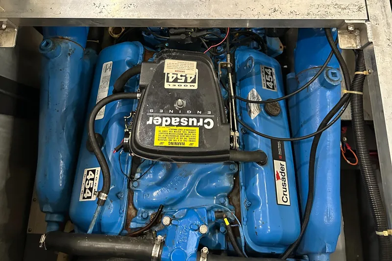 Slide: The Image of 1991 Carver 33 Aft Cabin engine, Crusader 454, blue, detailed view. - 41