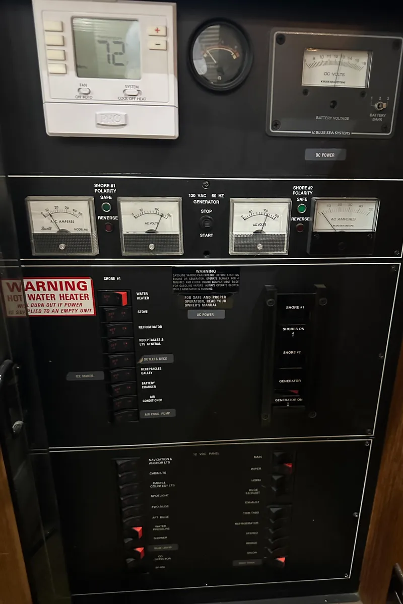 Slide: The Image of Electrical control panel of a 1991 Carver 33 Aft Cabin boat. - 19