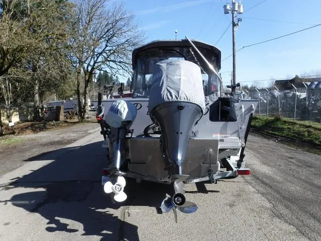 Slide: The Image of 2023 Duckworth Pacific Navigator 22' boat, rear view on a sunny day. - 3