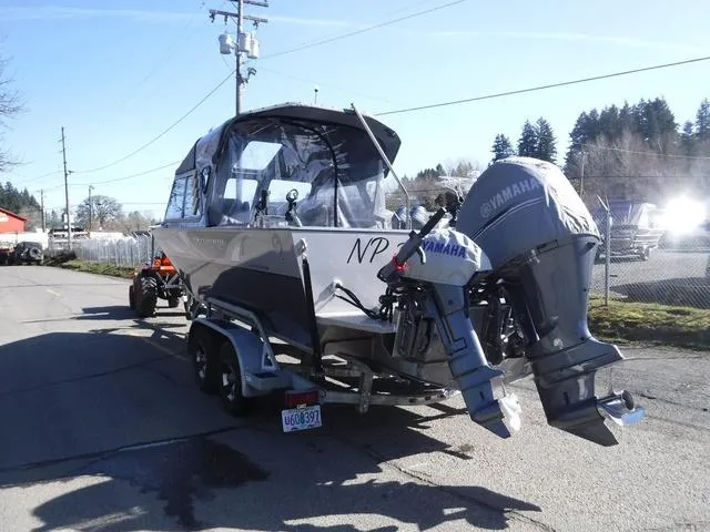 Slide: The Image of 2023 Duckworth Pacific Navigator 22' boat with Yamaha outboard motors on a trailer. - 4