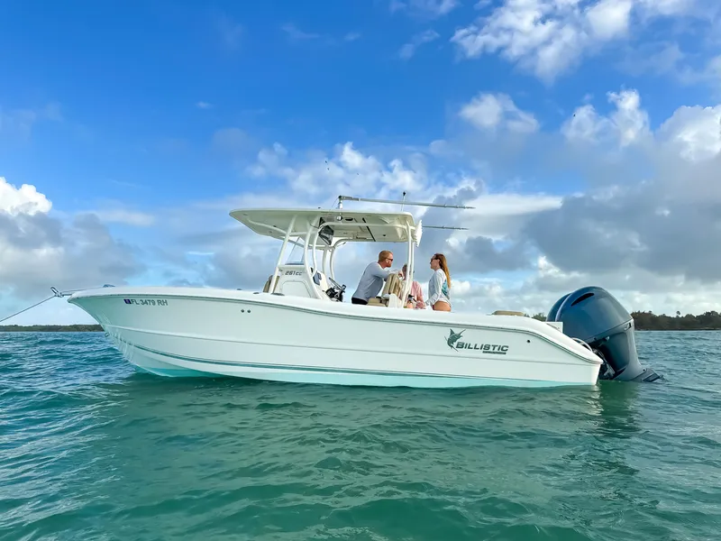 Slide: The Image of 2017 Key West Billistic 261 Center Console boat on water under blue sky. - 3