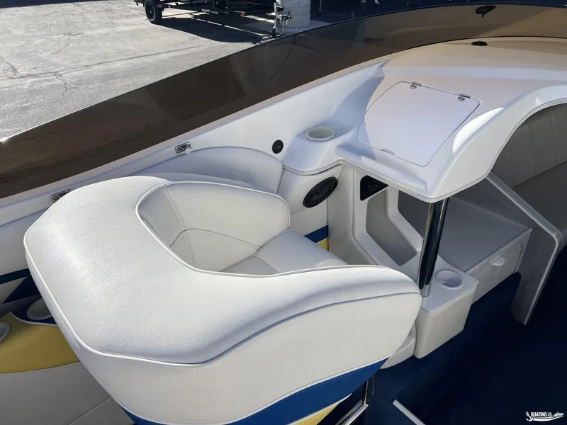 Slide: The Image of White seating area on a 2002 Nordic 28 Heat MCOB boat interior. - 11