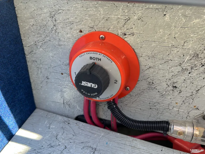 Slide: The Image of Red battery switch on Nordic 28 Heat MCOB, 2002 model, with wiring connections. - 20