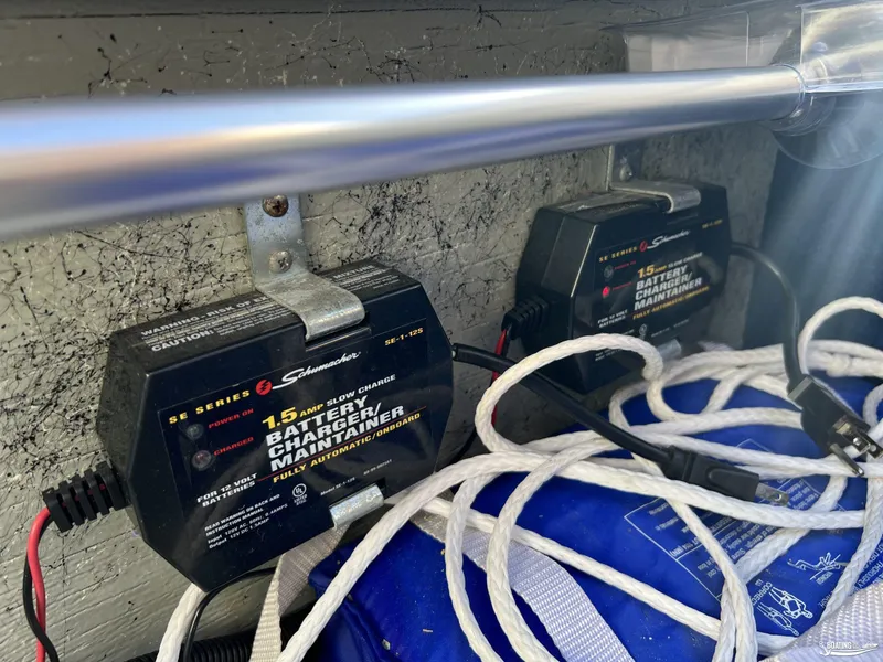 Slide: The Image of Battery chargers and cables in a Nordic 28 Heat MCOB, 2002 model. - 21