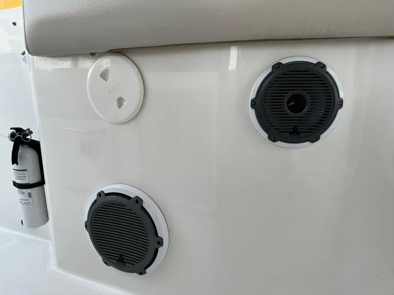 Slide: The Image of 2019 Boston Whaler 380 Outrage interior with speakers and fire extinguisher. - 21
