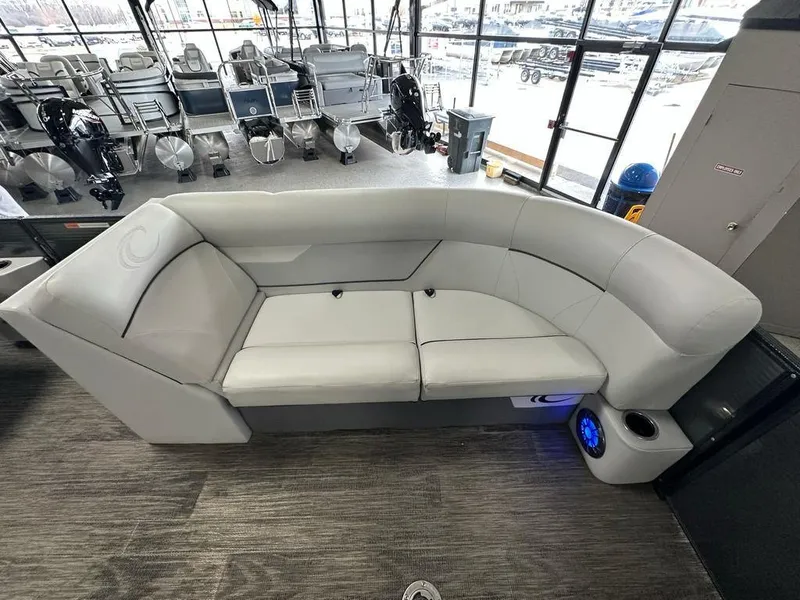 Slide: The Image of Luxurious seating on 2022 Crest Classic LX 220 SLRC CPT pontoon boat, showroom display. - 5