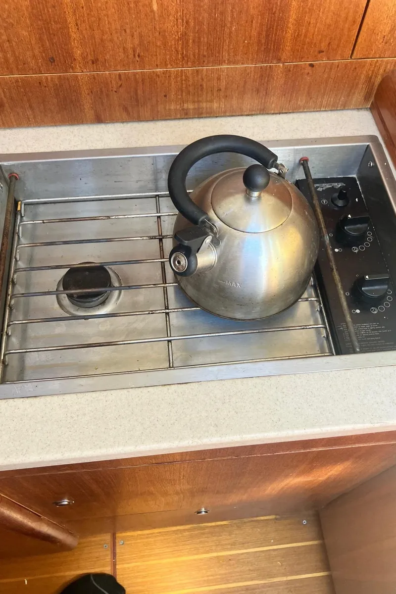 Slide: The Image of Stainless steel kettle on Hunter 326 yacht stove, 2003 model. - 8