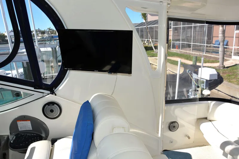 Slide: The Image of Interior of 2006 Cruisers Yachts 415 Express Motoryacht with TV and seating area. - 15
