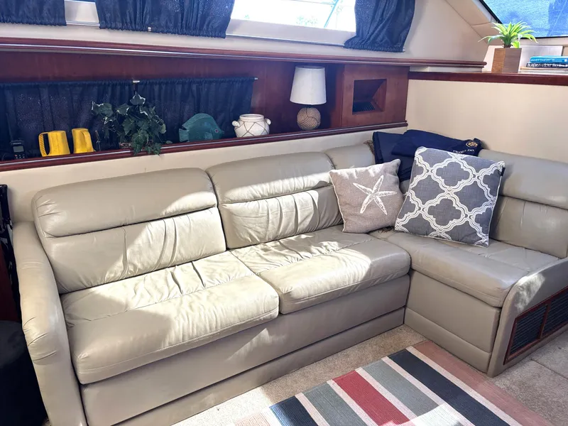 Slide: The Image of Luxurious interior of 2006 Cruisers Yachts 415 Express Motoryacht with plush seating and decor. - 36