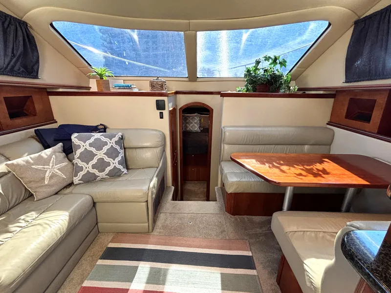 Slide: The Image of Luxurious interior of 2006 Cruisers Yachts 415 Express Motoryacht with plush seating and natural light. - 37