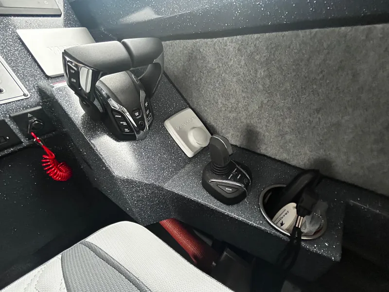 Slide: The Image of Control panel of 2025 Duckworth 30 XL boat with modern throttle and joystick. - 14