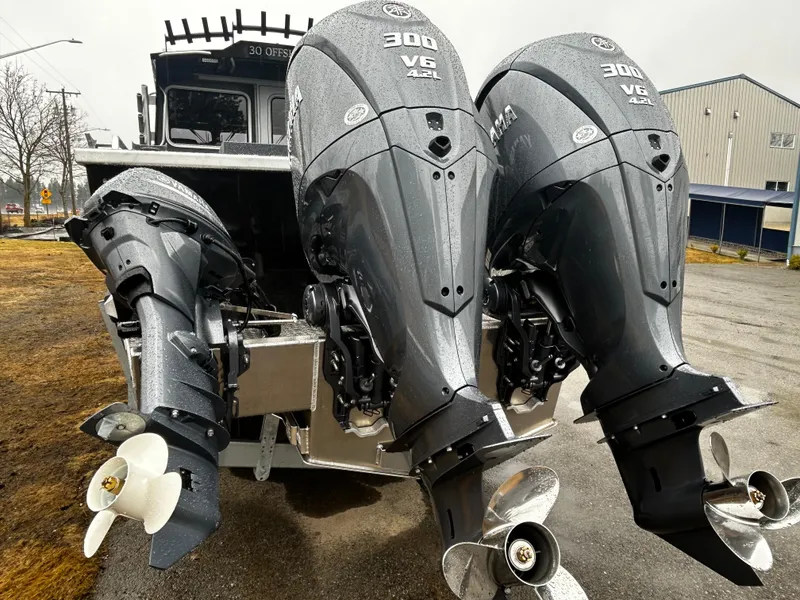 Slide: The Image of Duckworth 30 XL 2025 boat with triple Yamaha 300 V6 outboard engines. - 3