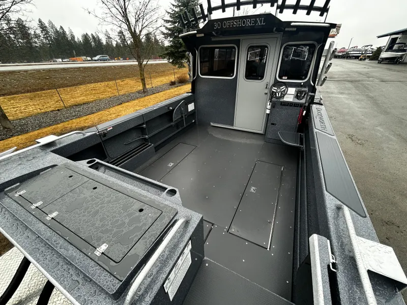 Slide: The Image of 2025 Duckworth 30 XL boat interior, spacious deck, modern design, and durable materials. - 4
