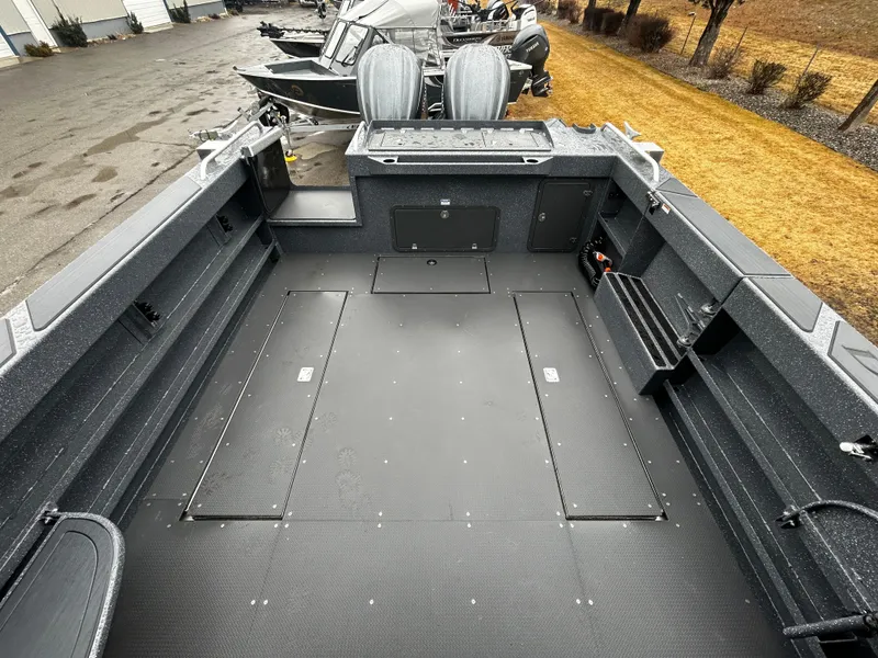 Slide: The Image of Duckworth 30 XL 2025 boat interior with spacious deck and storage compartments. - 6