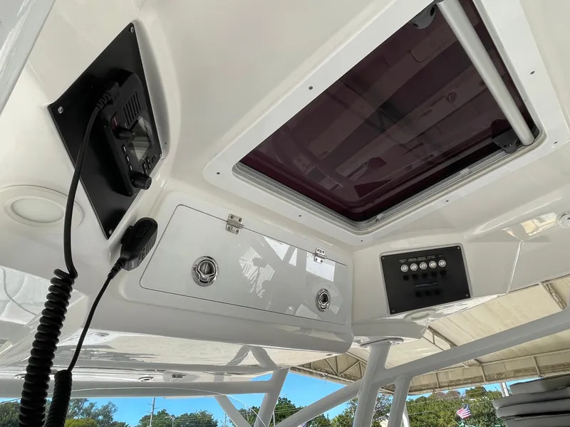 Slide: The Image of Interior view of 2020 Sea Fox 328 Commander boat console with radio and control panel. - 10