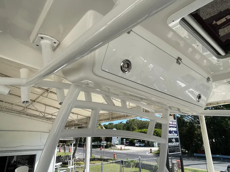 Slide: The Image of 2020 Sea Fox 328 Commander boat interior with storage compartment and rod holders. - 20