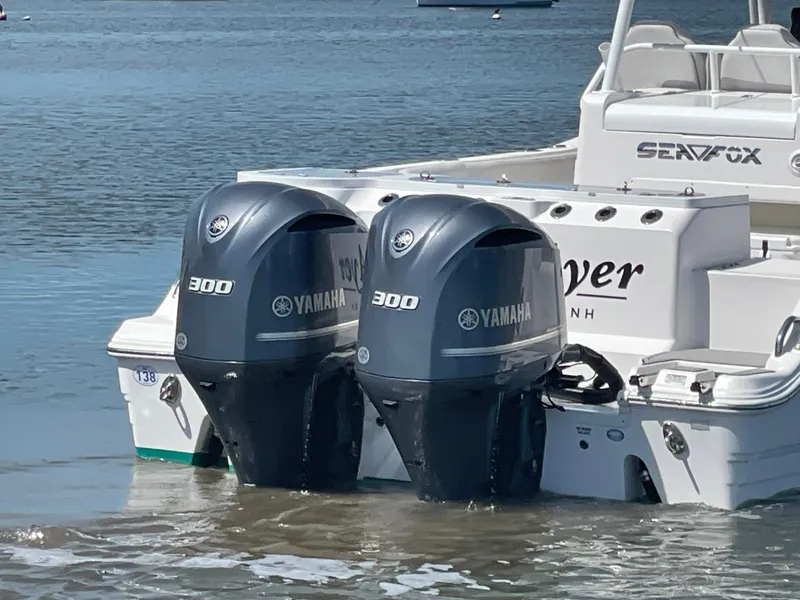 Slide: The Image of 2020 Sea Fox 328 Commander with twin Yamaha 300 engines in water. - 6