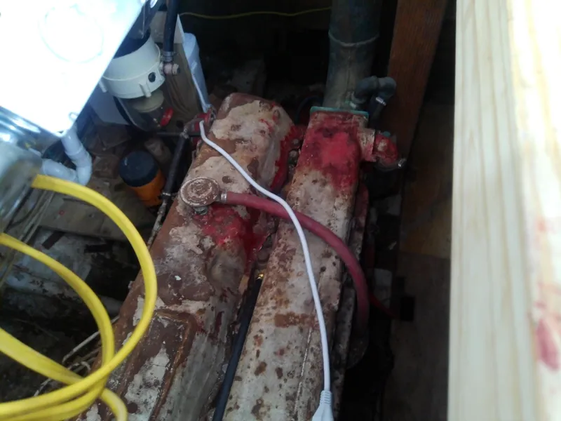 Slide: The Image of Engine compartment of a 1975 Marine Trader 40 Double Cabin boat. - 21