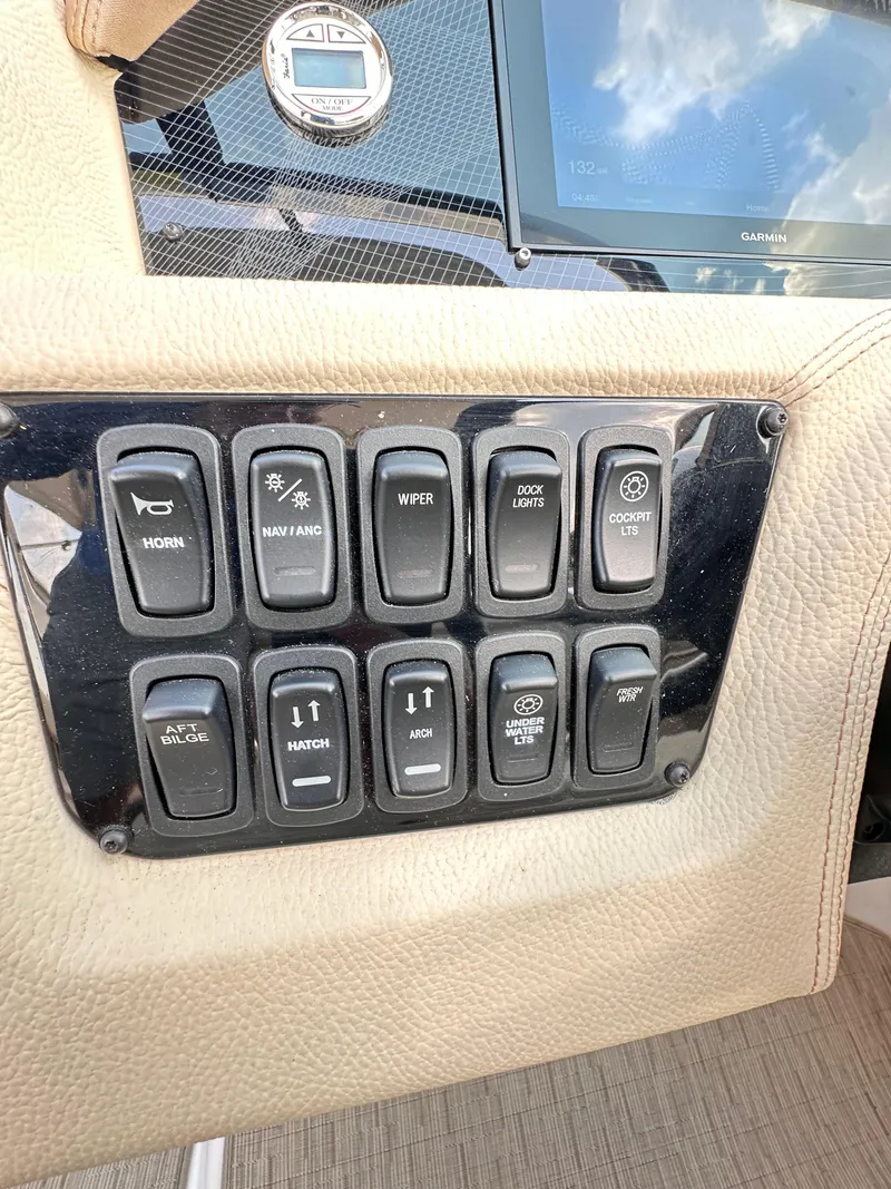 Slide: The Image of Dashboard control panel of a 2019 Regal 29 OBX boat. - 42