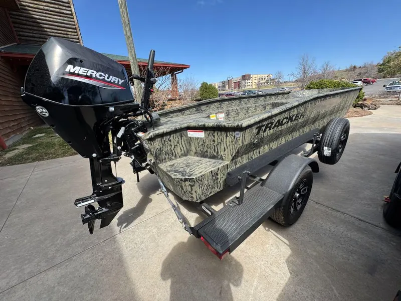 Slide: The Image of 2025 Tracker Grizzly 1650 T Prairie Wings Edition boat with Mercury outboard motor. - 4