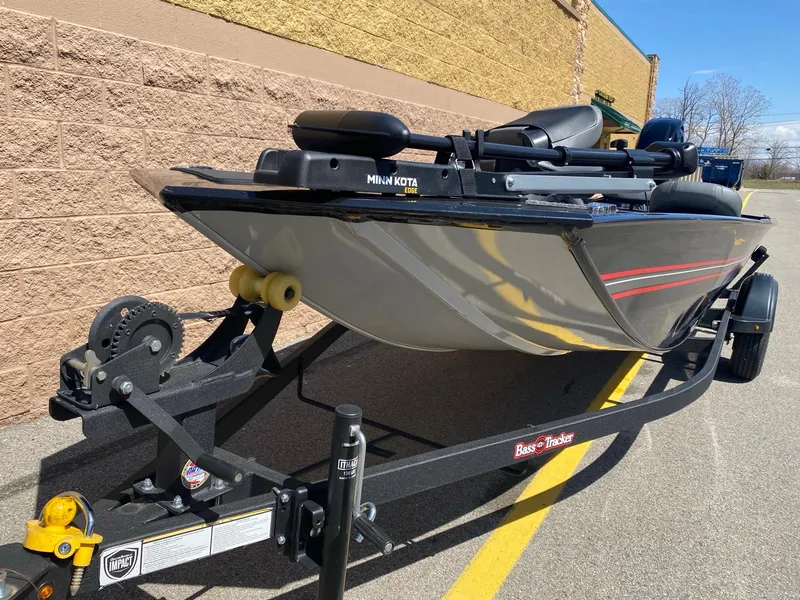 Slide: The Image of 2025 Tracker Bass Tracker Classic XL boat on trailer, parked outdoors. - 3