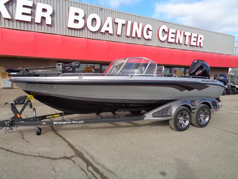 Slide: The Image of 2024 Ranger 620FS Ranger Cup Equipped boat at a dealership, on a trailer. - 2