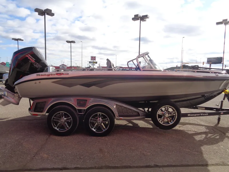Slide: The Image of 2024 Ranger 620FS Ranger Cup Equipped boat on trailer, side view, outdoors. - 4