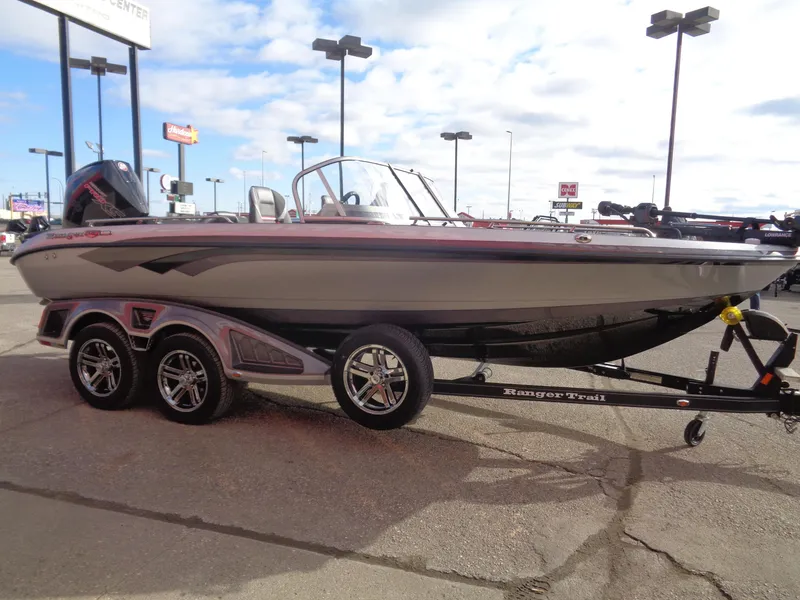 Slide: The Image of 2024 Ranger 620FS Ranger Cup Equipped boat on trailer, parked outdoors. - 5