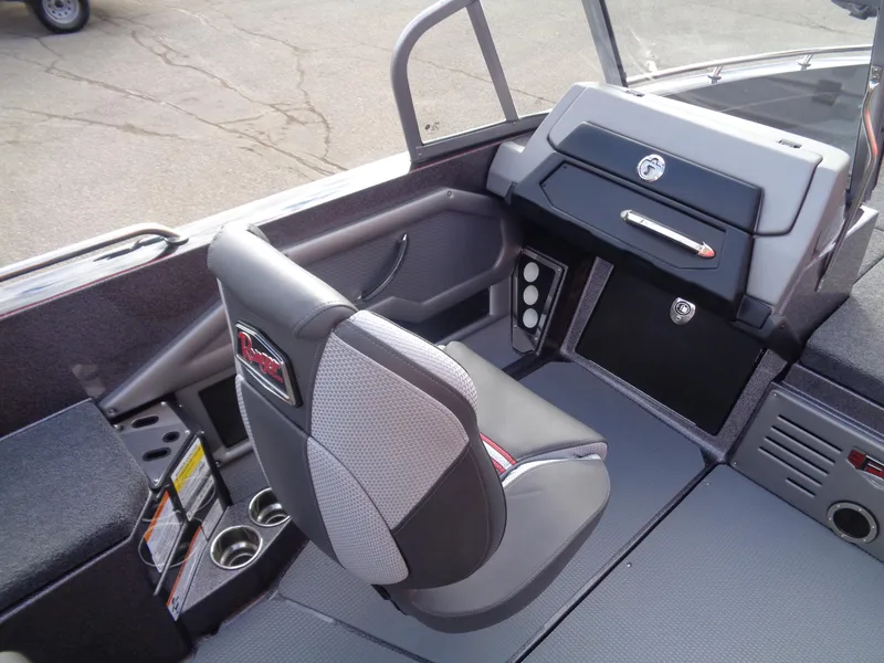 Slide: The Image of 2024 Ranger 620FS Ranger Cup boat interior with modern seating and dashboard. - 8