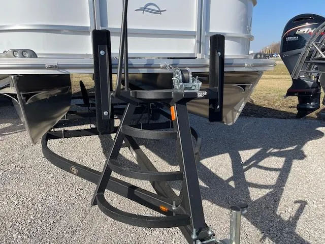 Slide: The Image of 2025 SunCatcher Select 20RC pontoon boat trailer hitch and motor detail. - 11