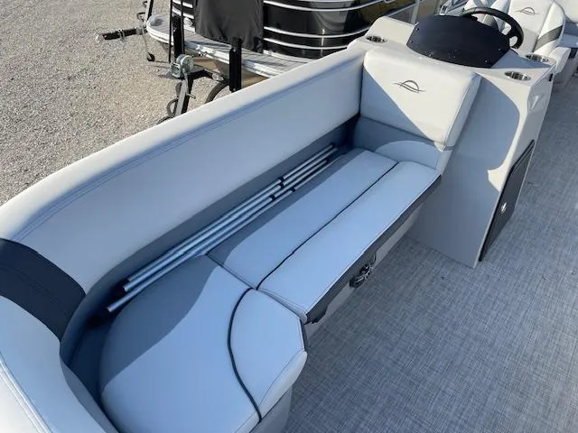 Slide: The Image of 2025 SunCatcher Select 20RC boat interior with sleek seating and modern design. - 12
