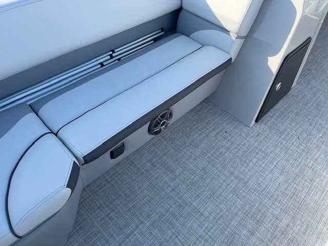 Slide: The Image of 2025 SunCatcher Select 20RC boat interior with sleek seating and modern design. - 14