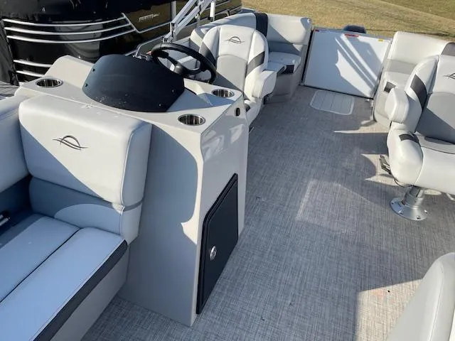 Slide: The Image of Interior of 2025 SunCatcher Select 20RC pontoon boat with modern seating and helm. - 15