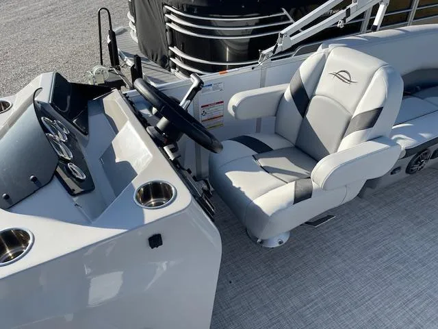 Slide: The Image of Captain's seat and console of 2025 SunCatcher Select 20RC pontoon boat. - 17