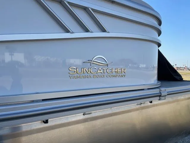 Slide: The Image of SunCatcher Select 20RC 2025 boat by Yamaha, sleek design detail. - 4
