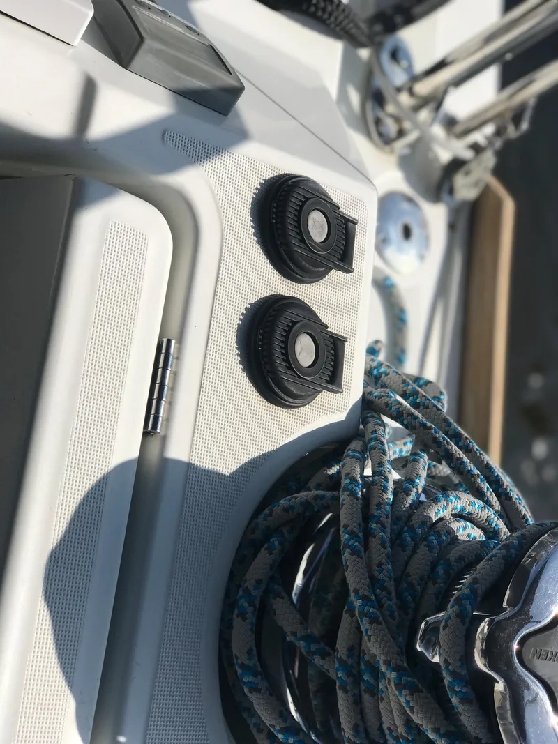 Slide: The Image of Close-up of 2014 Beneteau Oceanis 48 sailboat deck with winches and ropes. - 14