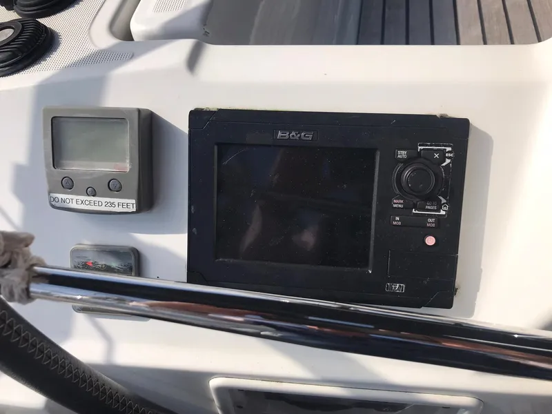 Slide: The Image of Control panel of 2014 Beneteau Oceanis 48 sailboat with navigation equipment. - 15