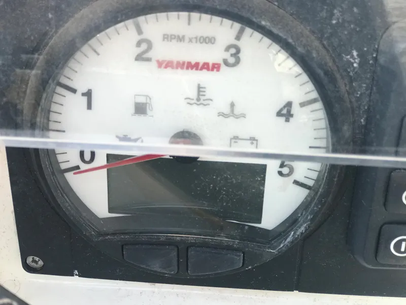 Slide: The Image of Yanmar RPM gauge on 2014 Beneteau Oceanis 48 sailboat dashboard. - 19