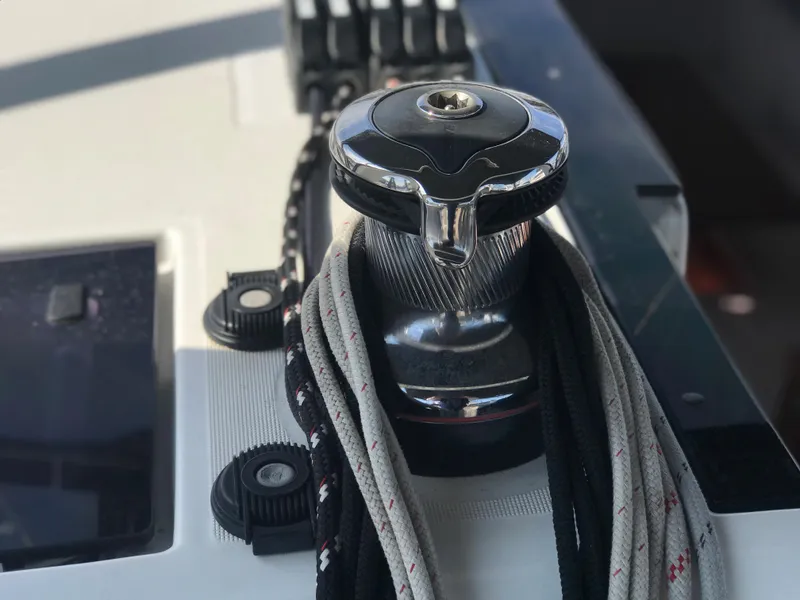 Slide: The Image of Close-up of winch and ropes on 2014 Beneteau Oceanis 48 sailboat deck. - 20