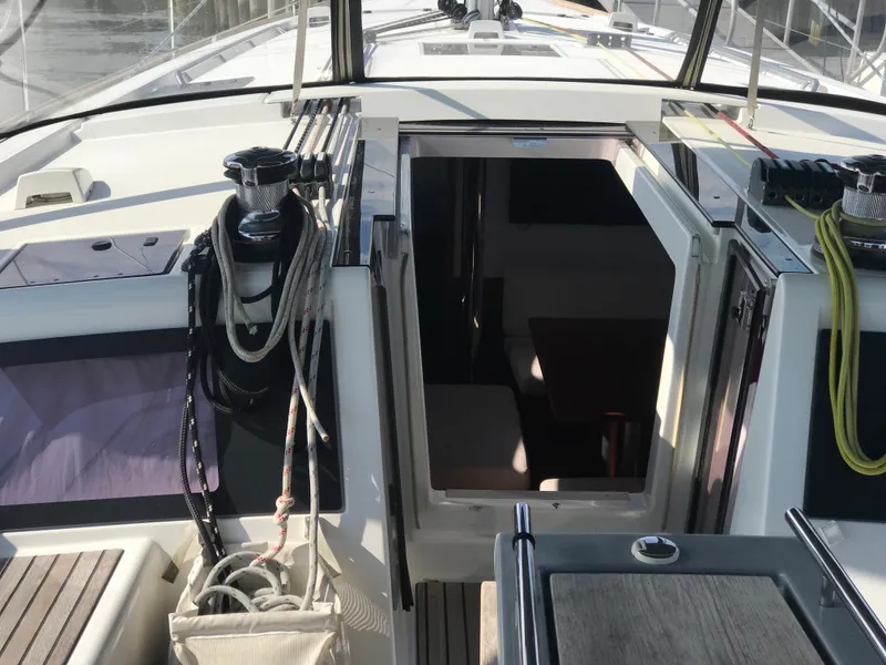 Slide: The Image of Cockpit view of 2014 Beneteau Oceanis 48 sailboat, showing entrance to cabin. - 22