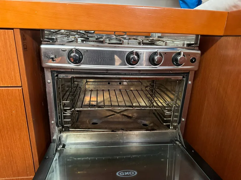 Slide: The Image of Stainless steel oven in 2014 Beneteau Oceanis 48 yacht kitchen. - 32