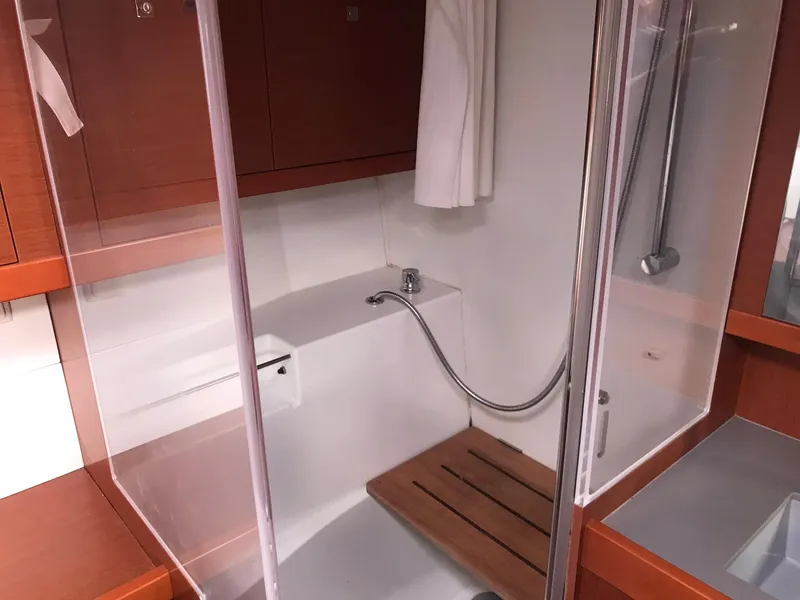 Slide: The Image of Bathroom interior of 2014 Beneteau Oceanis 48 yacht with wooden accents and modern fixtures. - 43