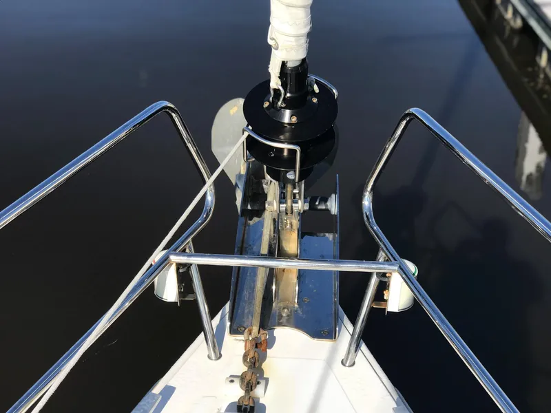 Slide: The Image of Bow of 2014 Beneteau Oceanis 48 sailboat with anchor and stainless steel fittings. - 73